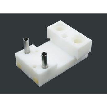Pulsator block, teflon, used